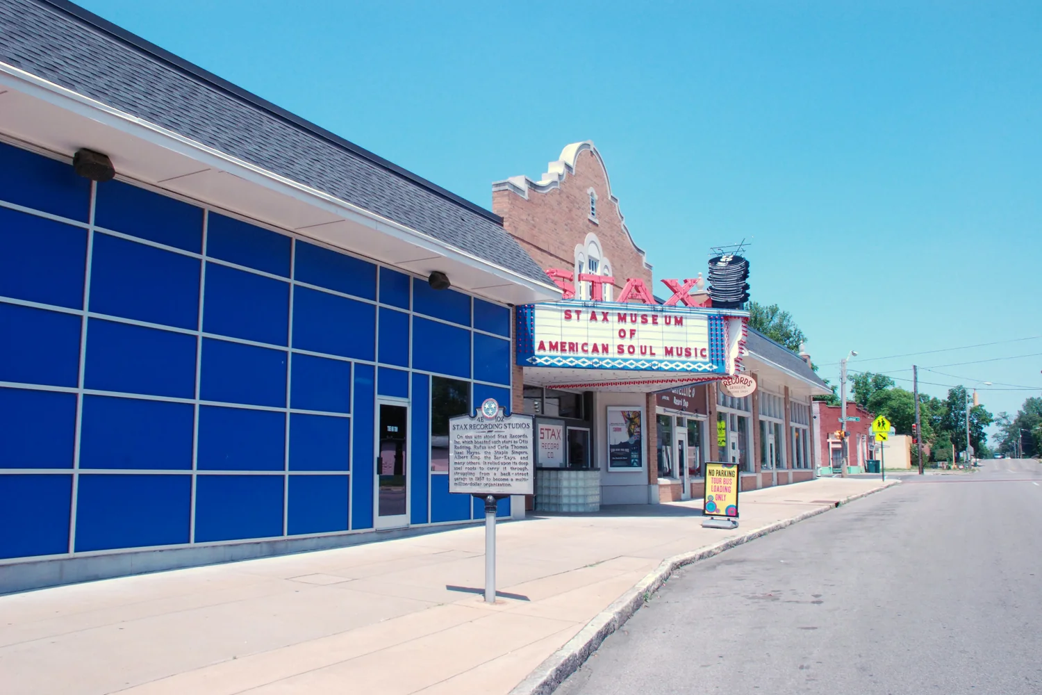 Blue-fronted Stax Museum and its marquee beside a Memphis sidewalk.